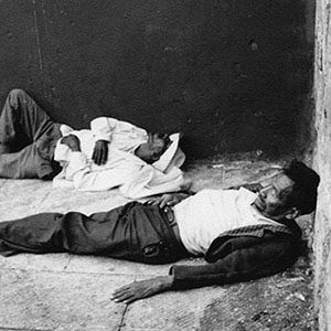 Two Men Asleep in an Empty Pool